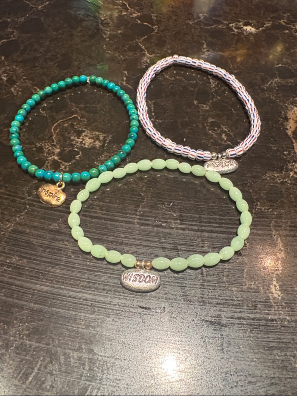 OKO designs inspire, peace and wisdom stretch bracelets